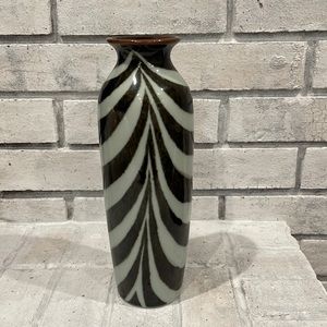 Ceramic leopard vase. Color: teal & brown. 10.5 inches tall & top is 2.5 inches